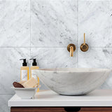 Italian Bianco Carrara marble slab with soft gray veining from Sapphirus Stone in Toronto. Ideal for kitchens, bathrooms, and luxury interiors.