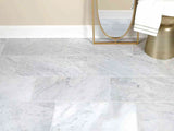 Italian Bianco Carrara marble slab with soft gray veining from Sapphirus Stone in Toronto. Ideal for kitchens, bathrooms, and luxury interiors.