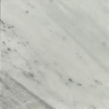Italian Bianco Carrara marble slab with soft gray veining from Sapphirus Stone in Toronto. Ideal for kitchens, bathrooms, and luxury interiors.