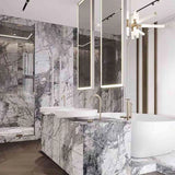 Invisible Grey Marble tile with flowing white and gold veining from Sapphirus Stone Toronto. Ideal for modern feature walls and luxury flooring.