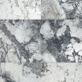Invisible Grey Marble tile with flowing white and gold veining from Sapphirus Stone Toronto. Ideal for modern feature walls and luxury flooring.