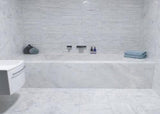 Bianco Ibiza Marble tile with soft gray veining on a white base from Sapphirus Stone Toronto. Perfect for modern walls, countertops, and bathrooms.
