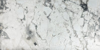 Invisible Grey Marble tile with flowing white and gold veining from Sapphirus Stone Toronto. Ideal for modern feature walls and luxury flooring.