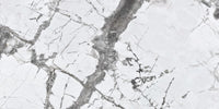 Invisible Grey Marble tile with flowing white and gold veining from Sapphirus Stone Toronto. Ideal for modern feature walls and luxury flooring.