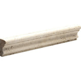 Ivory Honed Andorra Travertine molding with sculpted curve from Sapphirus Stone Toronto. Ideal for backsplash caps, trim edges, and wall accents.