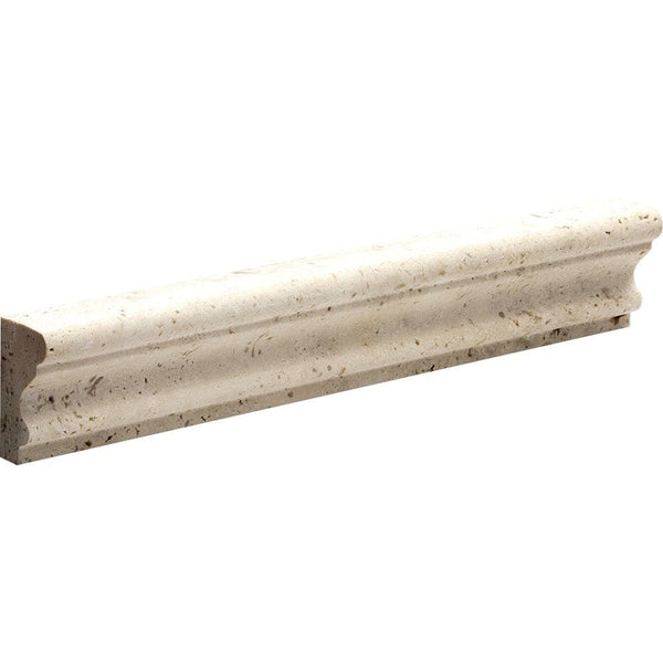 Ivory Honed Andorra Travertine molding with sculpted curve from Sapphirus Stone Toronto. Ideal for backsplash caps, trim edges, and wall accents.