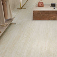 Travertine Marvel Light 24x48 wall and floor tile in contemporary commercial lobby design