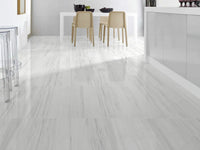 Elegant living room floor with Bianco Dolomite marble tiles Toronto